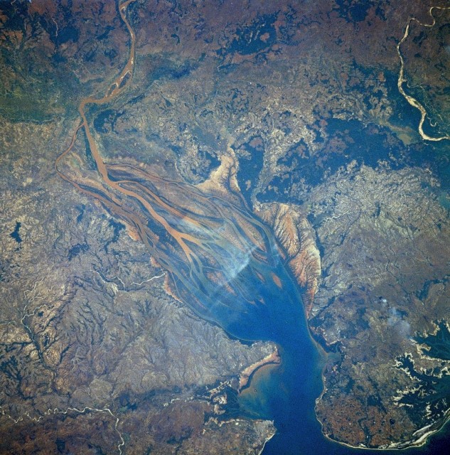 Unregulated deforestation in Madagascar has tragically eroded the watershed of the Betsiboka River and choked off the river valley below.